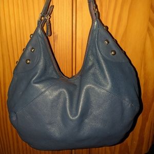 Michael Rome Design blue leather hobo bag.